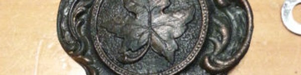 Pendulum bob for Arthur Pequegnat Maple Leaf kitchen clock