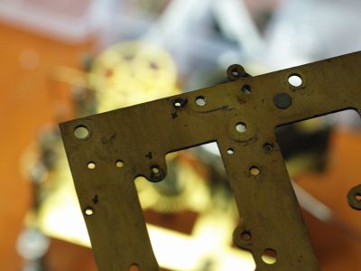 X marks pivot holes that need to be bushed