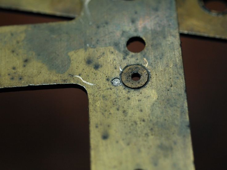 punch mark next to a bushing