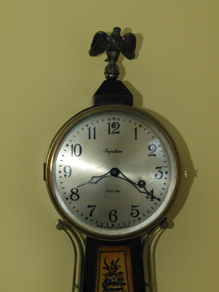 Clock face showing silvered dial and press-fit hands