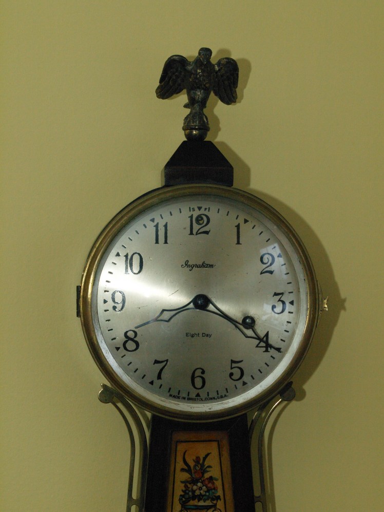 Clock face showing silvered dial and press-fit hands