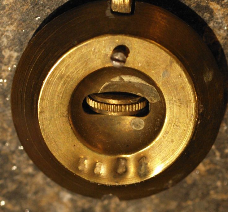 Pendulum back showing stamped numbers 