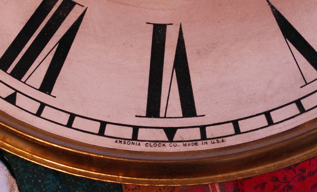 Ansonia clock face showing the name of the maker