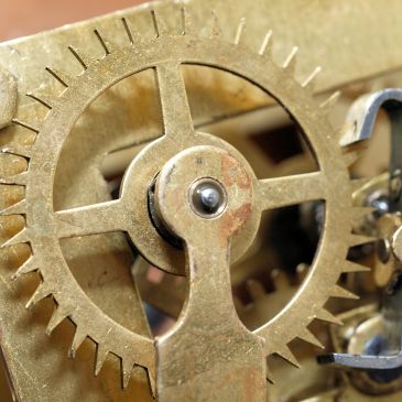 Bushing installed on escape wheel arbour