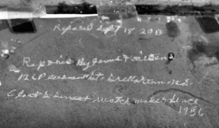 Inscription on folk art clock