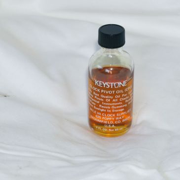 Clock pivot oil