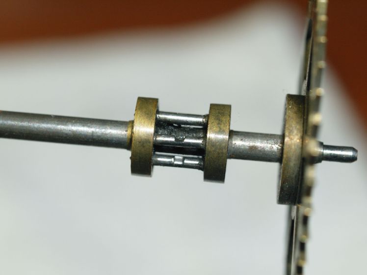 Lantern pinions on the escape wheel