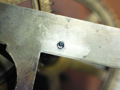 Looks like a large pivot hole but actally punched close to the hole