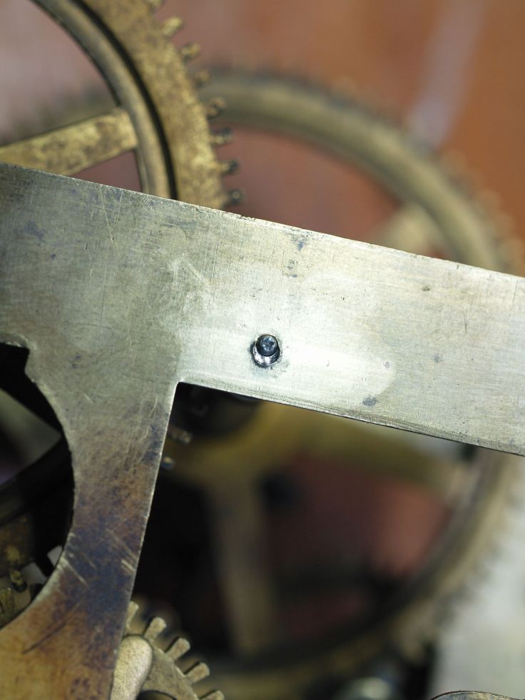 Looks like a large pivot hole but actally punched close to the hole