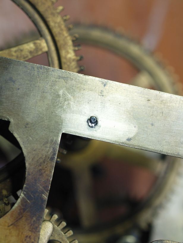 Looks like a large pivot hole but actally punched close to the hole