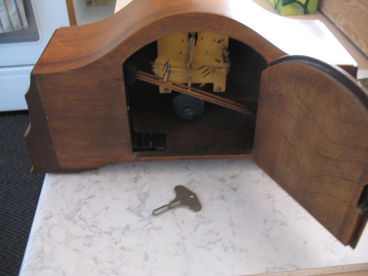 GGs clock showing German made movement and pendulum bob