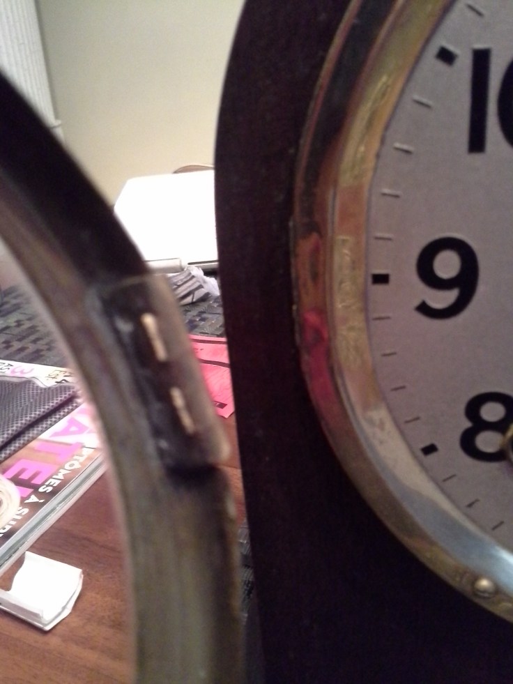 broken brass hinge