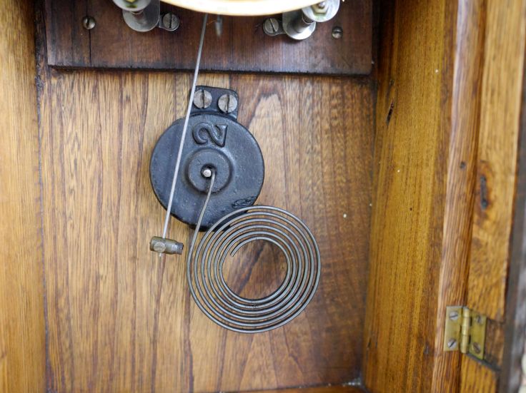 Hammer and coil gong