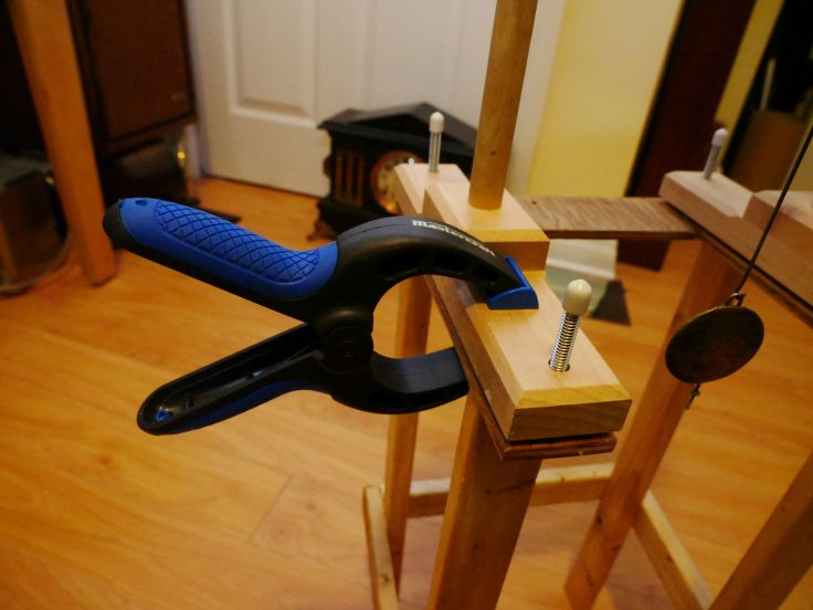A clamp (or 2) secures the stand to the extension