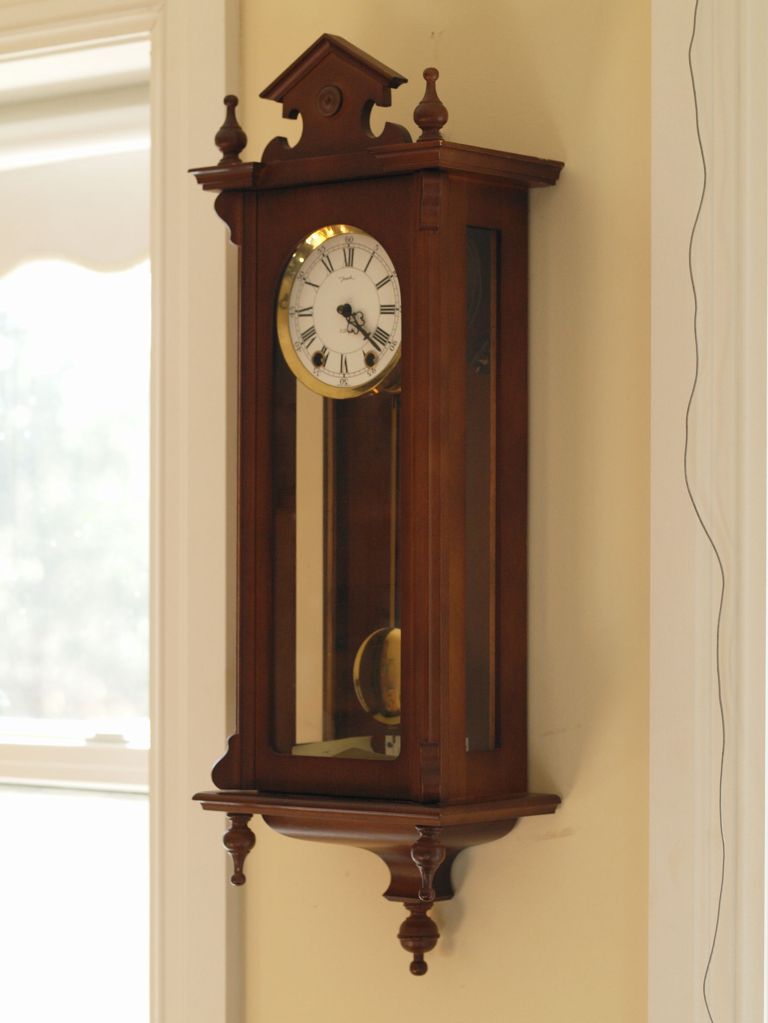 Jauch wall clock with a faux regulator case 