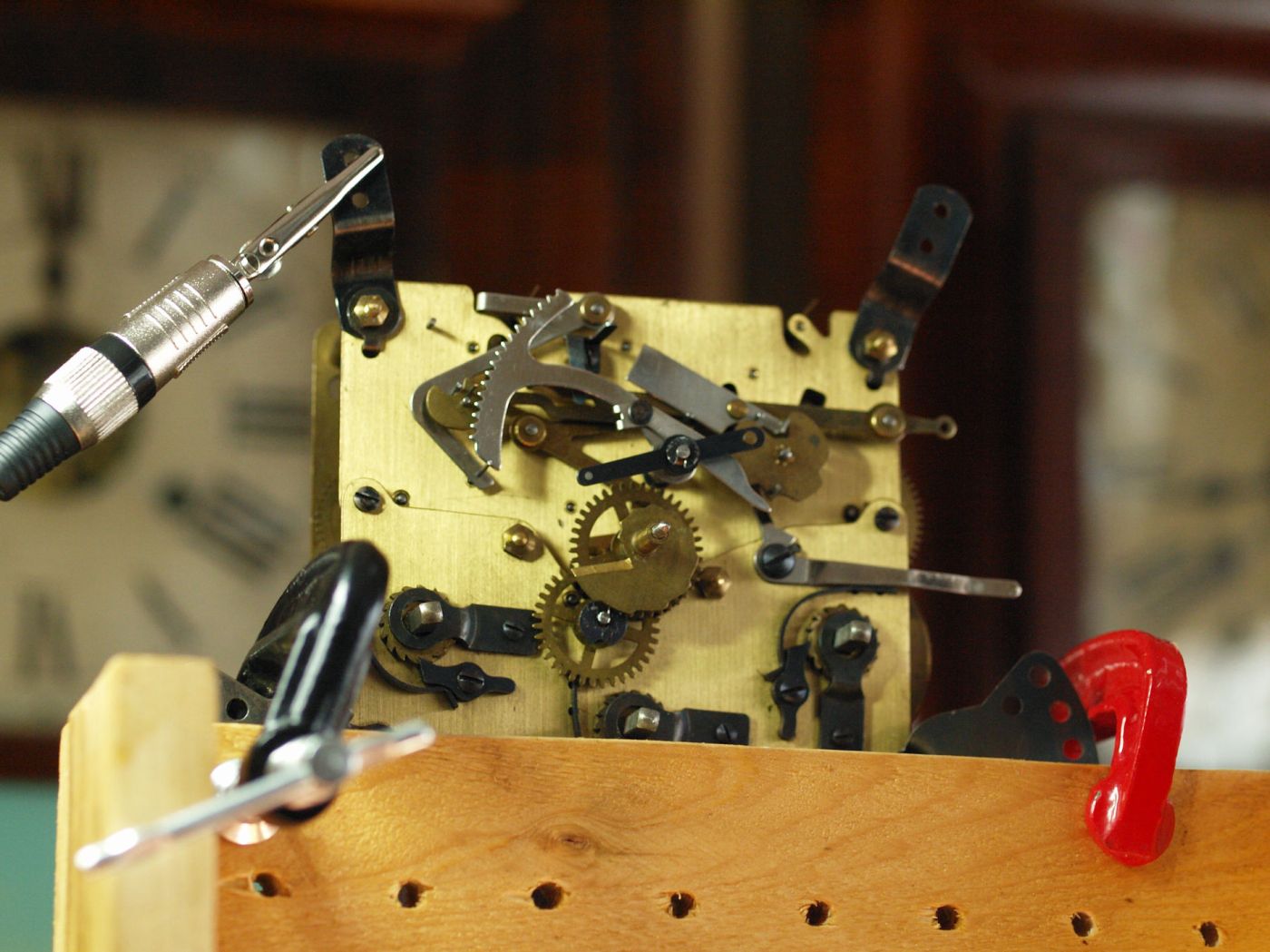 Girod movement on test stand,TimeTrax beat amplifier attached to movement.